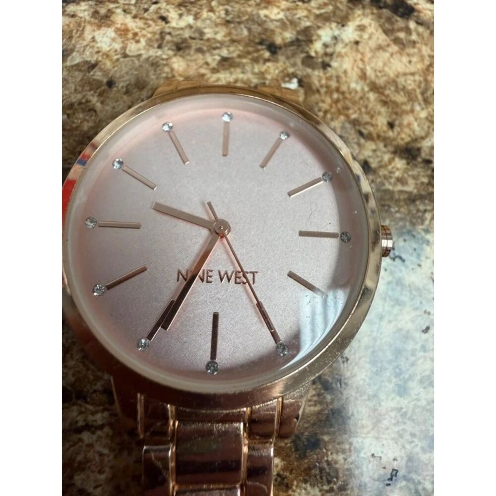 Nine West PC211 Rose Gold Tone Watch Pink Dial Crystal Markers Women’s Bracelet